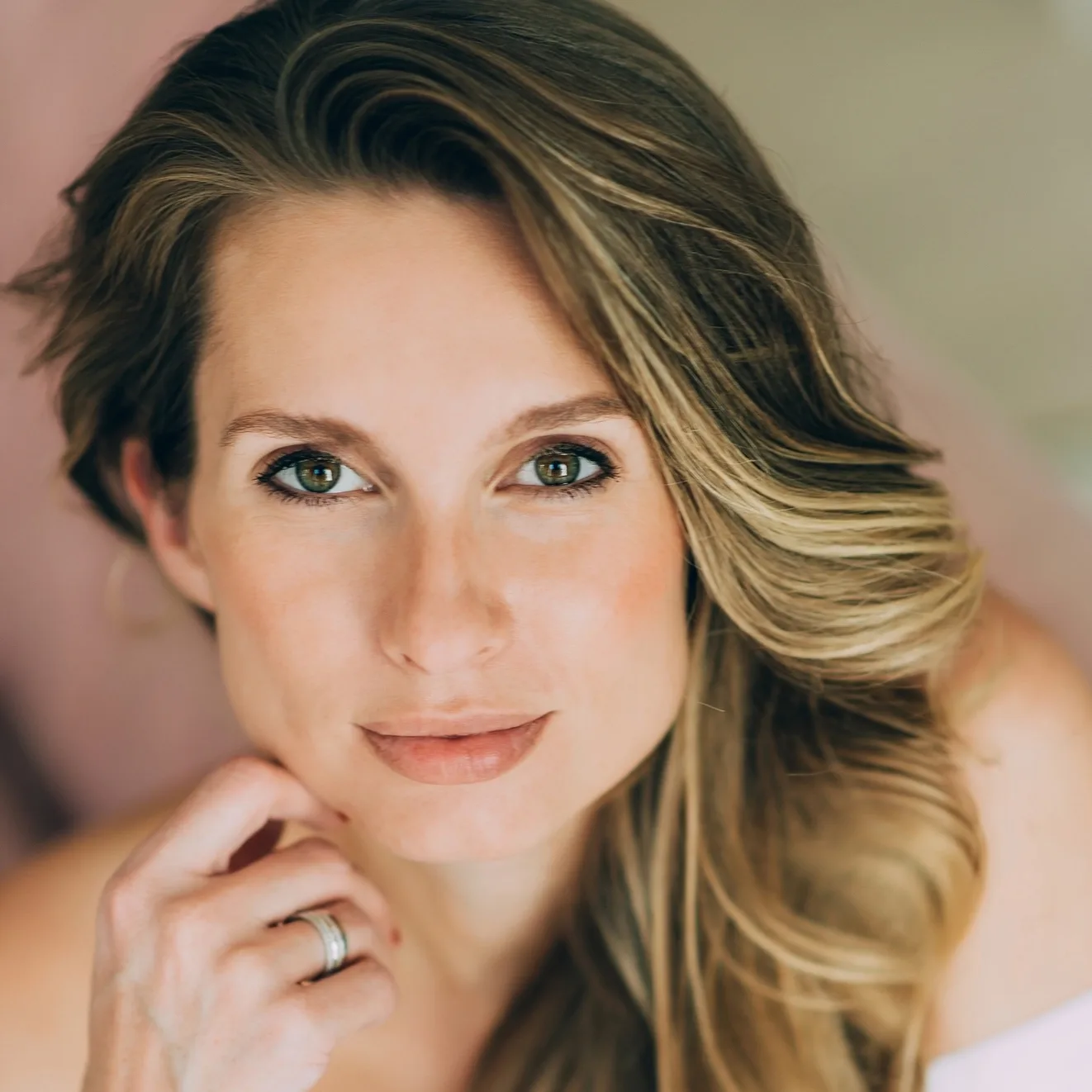 Stock blonde woman with green eyes looking at the camera