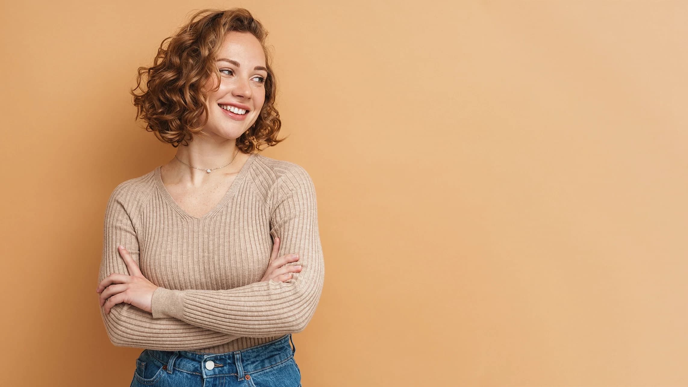 Happy woman with breast implants.