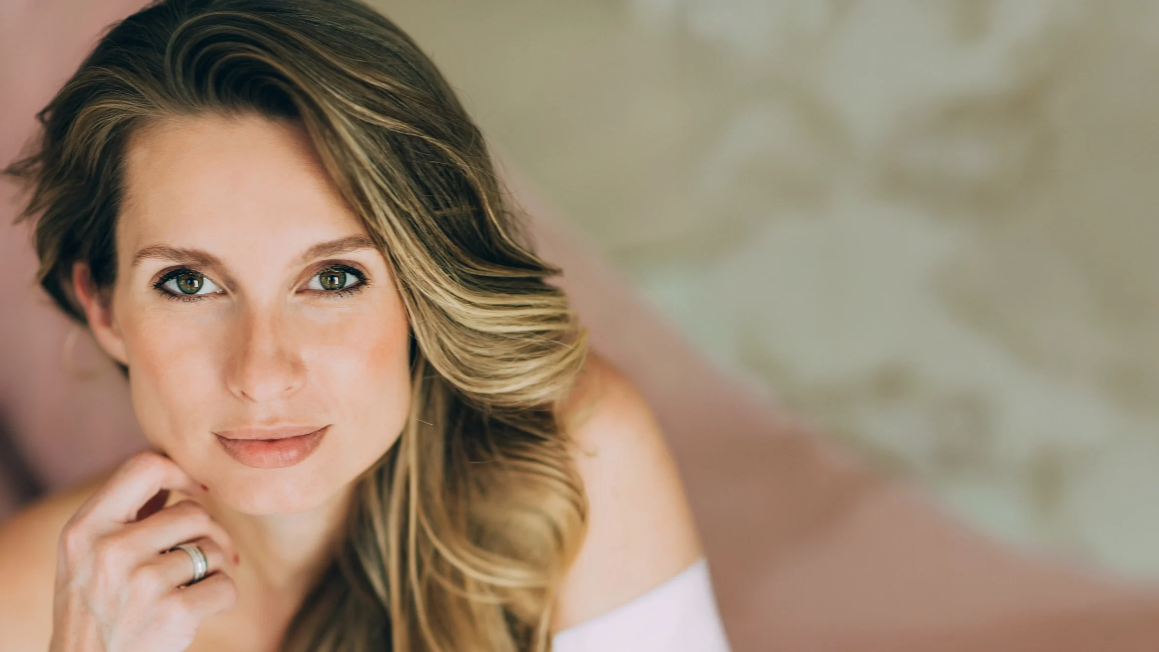 Stock blonde woman with green eyes looking at the camera