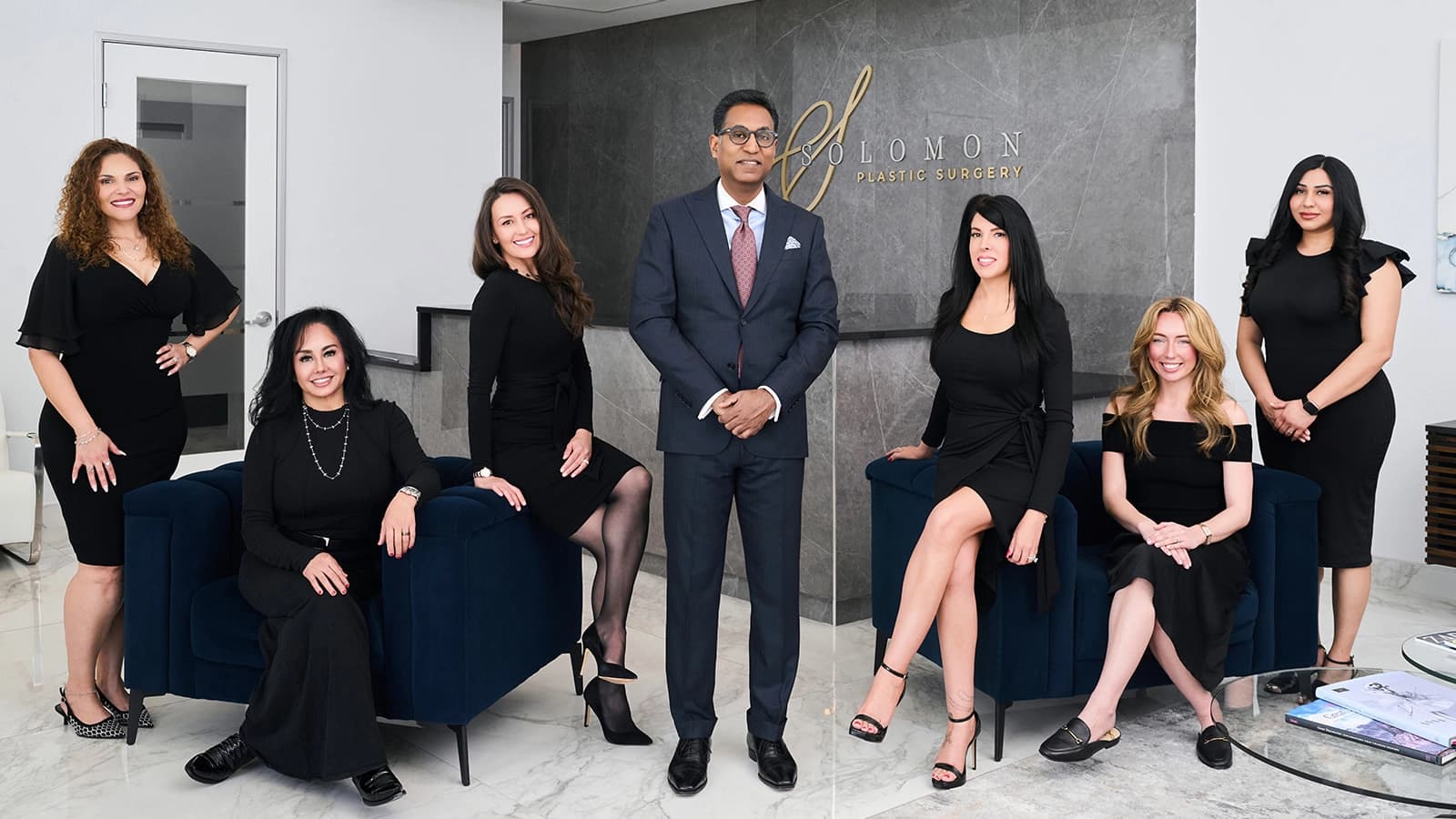 Dr. Solomon's Staff Posing on their practice in Texas