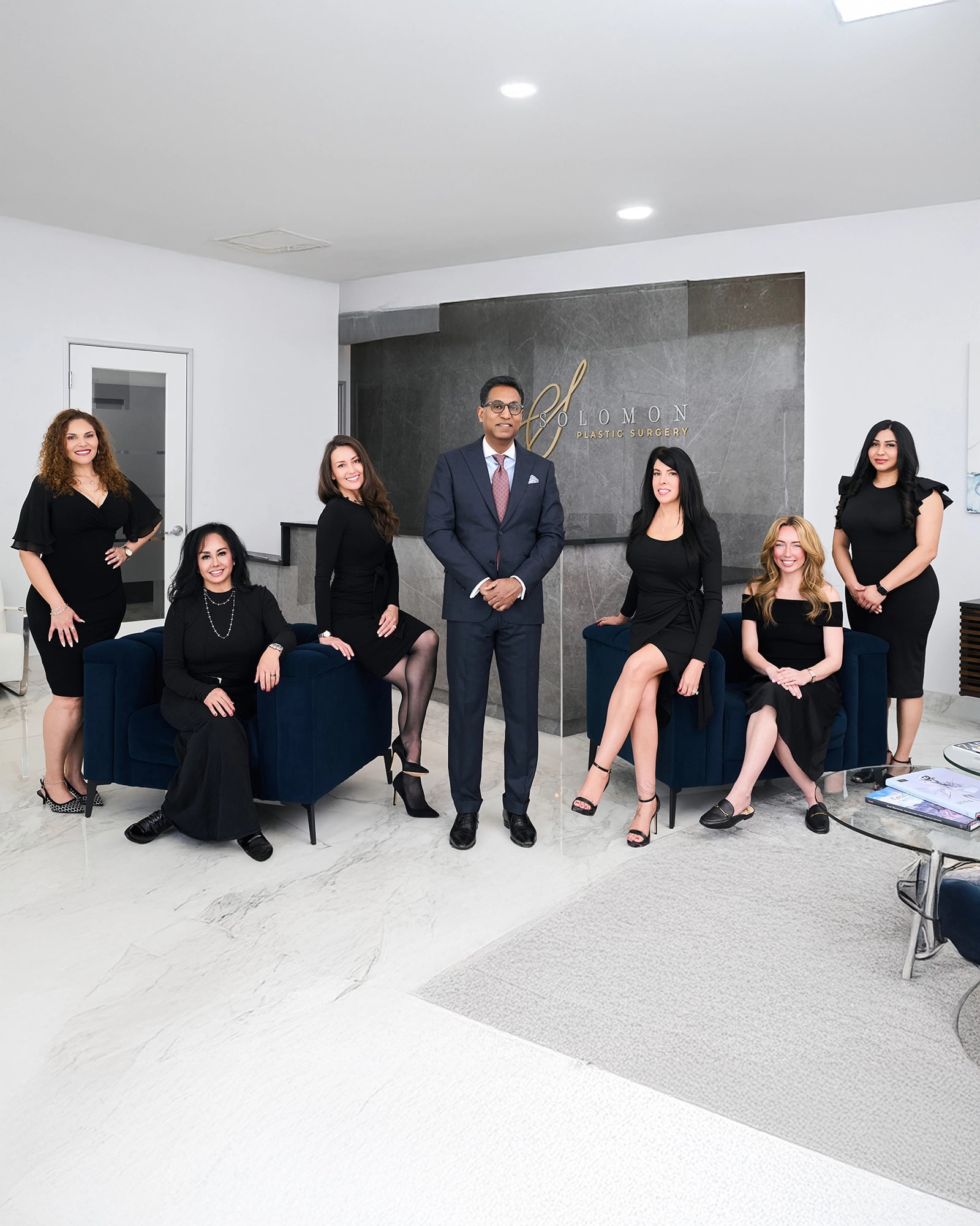 Dr. Solomon's Staff Posing on their practice in Texas