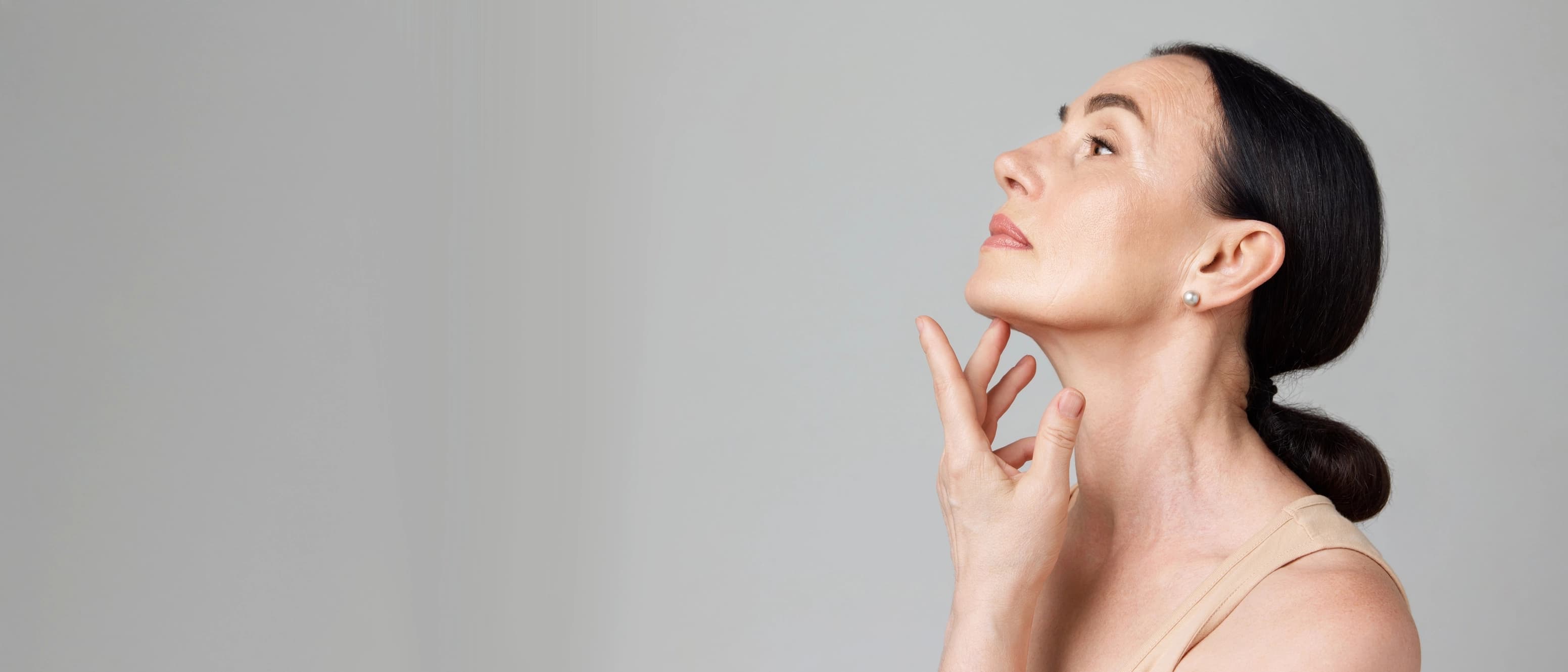 Woman showing her neck.