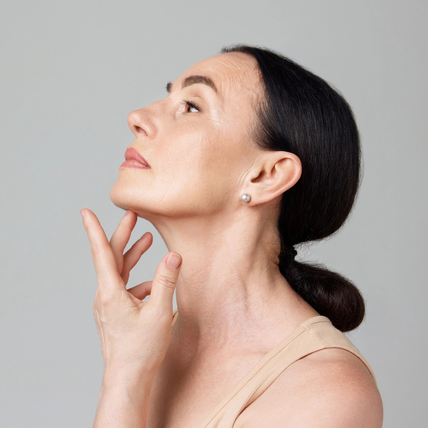 Woman showing her neck.