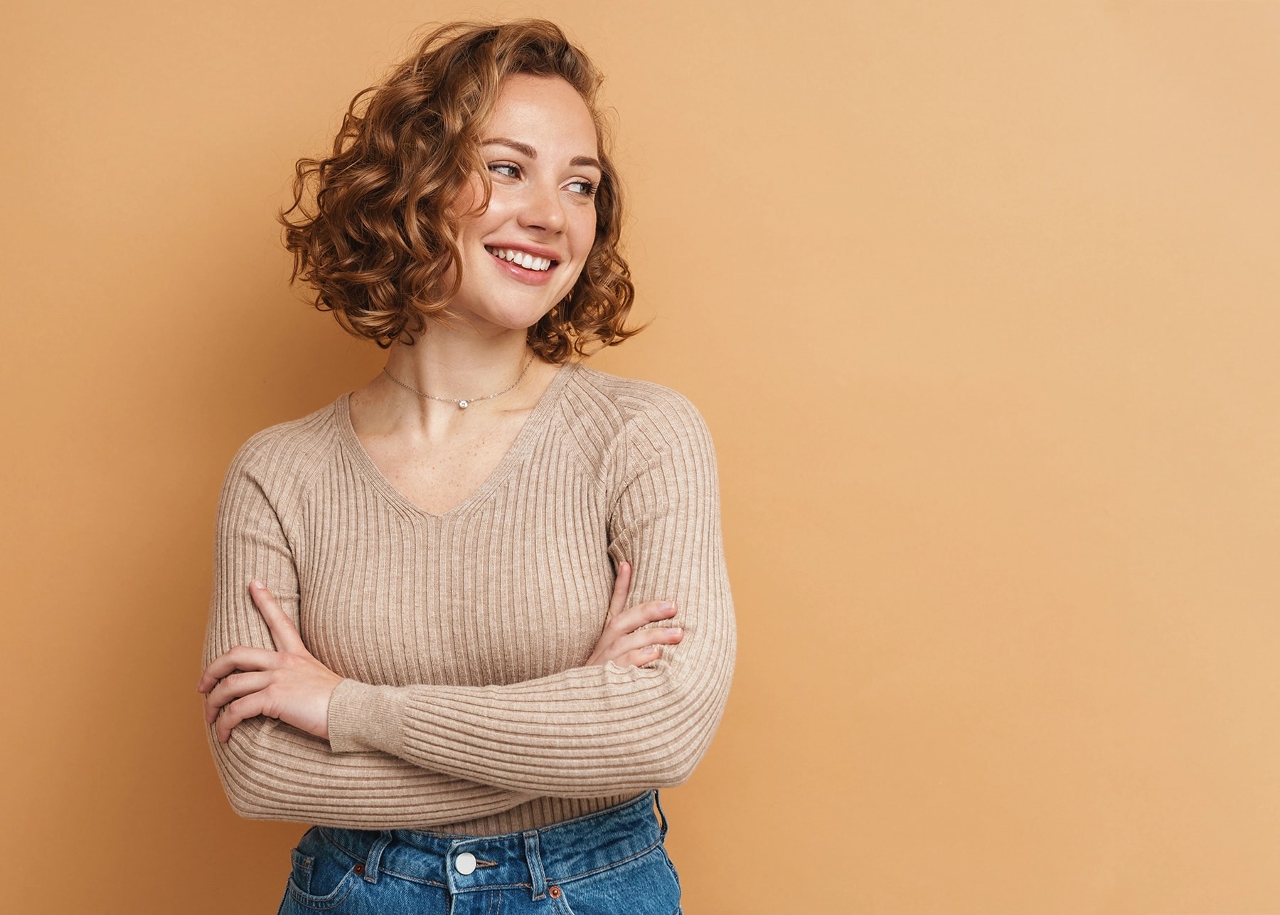 Happy woman with breast implants.