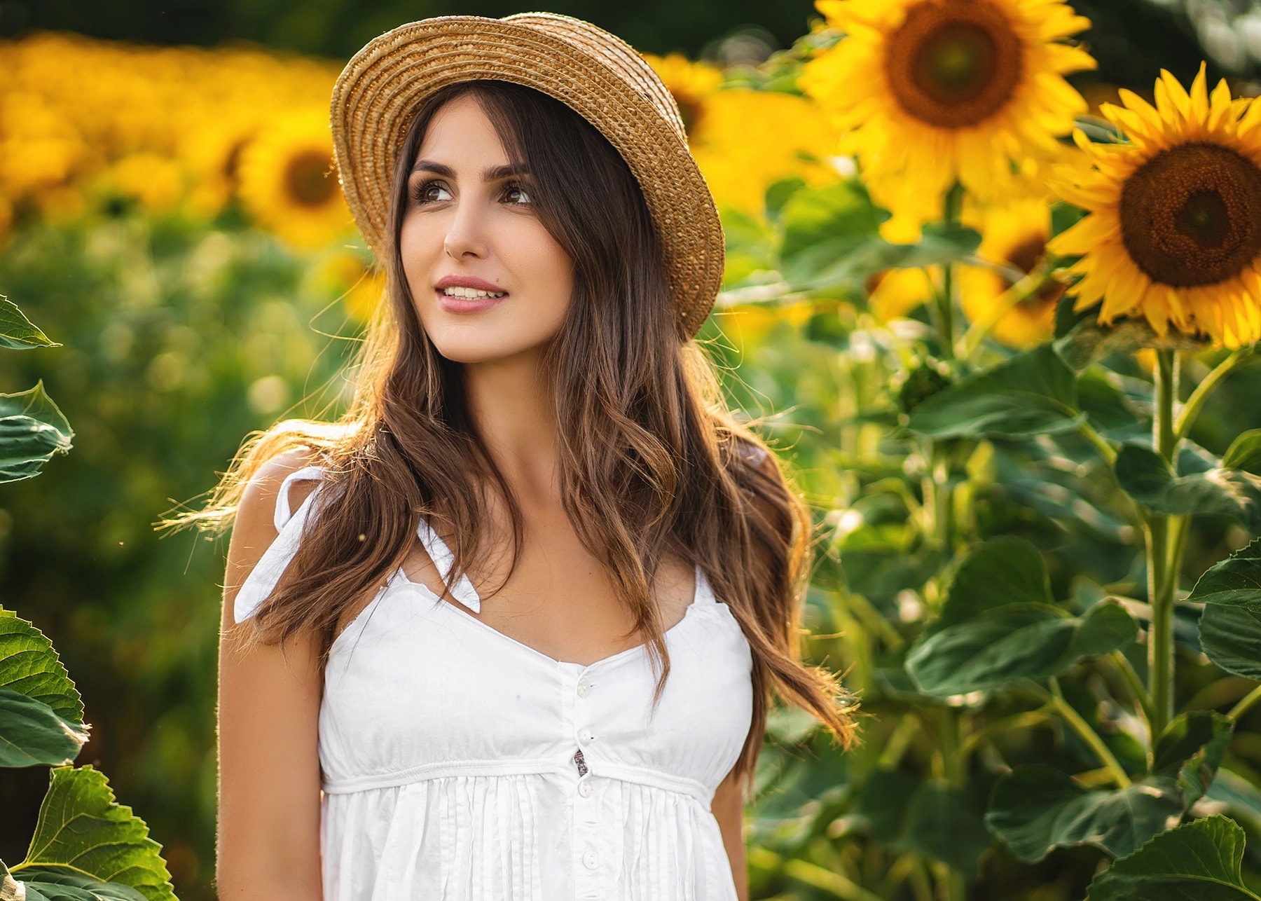 Happy woman in a summer dress.