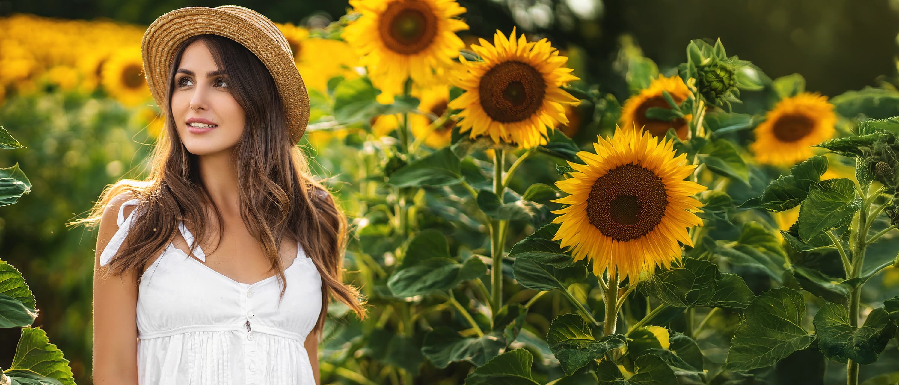 Happy woman in a summer dress.